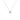 Close-up of Bvlgari B.zero1 spiral pendant in 18k white gold – sculptural necklace detail for collectors