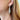 Model wearing platinum Art Deco diamond drop earrings – handcrafted fine jewelry from HGM Jewelry New Orleans