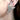 Model wearing vintage diamond spray earrings, New Orleans retro fine jewelry style