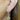 Diamond drop earrings in 18K rose gold worn on ear, New Orleans jewelry fashion style shot