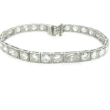 Art Deco platinum and diamond bracelet worn outdoors – elegant 1930s tennis bracelet styling