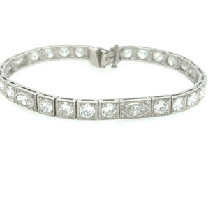 Art Deco platinum and diamond bracelet worn outdoors – elegant 1930s tennis bracelet styling