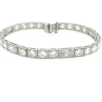 Art Deco platinum and diamond bracelet worn outdoors – elegant 1930s tennis bracelet styling