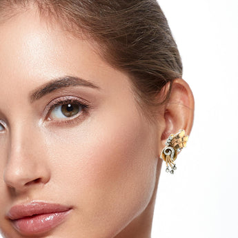 Model showcasing 1940s retro diamond and gold earrings – Statement vintage earrings New Orleans