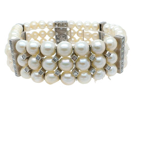 Vintage 1950s pearl and diamond bracelet set in platinum – timeless luxury jewelry from HGM New Orleans