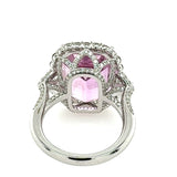 white gold and diamond  ring with kunzite gemstone on a white background