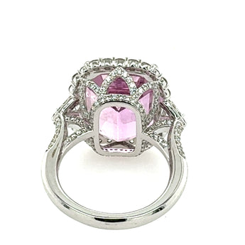 white gold and diamond  ring with kunzite gemstone on a white background