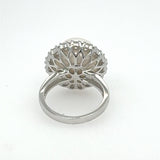 White South sea pearl and diamond ring  win an intricate 18k white gold ring on a white background 
