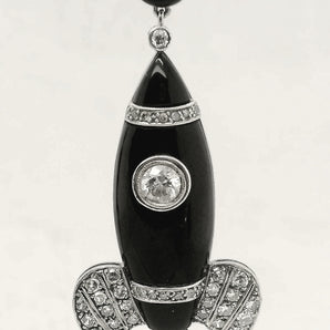 Antique art deco rocket earrings with black onyx, diamonds and platinum.Right earrings,  HGM Fine Jewelry 