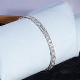 1920s Art Deco diamond bracelet worn on wrist – classic platinum Jazz Age jewelry