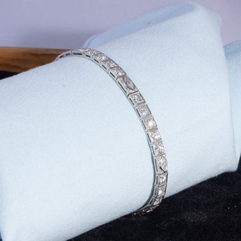 1920s Art Deco diamond bracelet worn on wrist – classic platinum Jazz Age jewelry