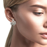Model wearing vintage Boucheron clip earring – Timeless diamond jewelry New Orleans