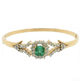 1.50 carat Colombian emerald and diamond bangle bracelet in 18k yellow gold – New Orleans fine jewelry by HGM