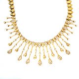 Contemporary 18k yellow gold necklace with 209 diamonds displayed flat – New Orleans luxury jewelry