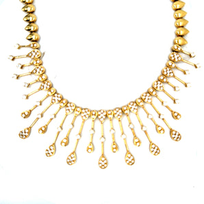 Contemporary 18k yellow gold necklace with 209 diamonds displayed flat – New Orleans luxury jewelry