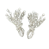 Front view of 1950s vintage diamond spray earrings in 18k white gold, retro glamour design