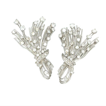 Front view of 1950s vintage diamond spray earrings in 18k white gold, retro glamour design