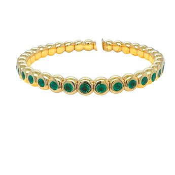 Stretch emerald bracelet in 18k yellow gold – stackable custom jewelry by HGM Jewelry New Orleans