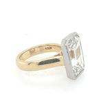 Side view of emerald cut diamond ring in gold setting – HGM Jewelry New Orleans
