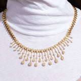Contemporary diamond necklace in 18k gold from artistic New Orleans jeweler – luxury full perspective view