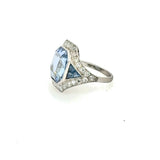 Platinum blue sapphire ring with diamond halo setting – luxury engagement ring at HGM Fine Jewelry New Orleans
