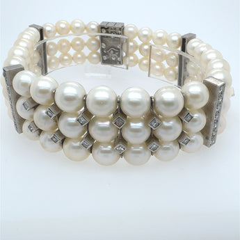 Side view of multi-row pearl bracelet from the 1950s – fine estate jewelry for women in New Orleans