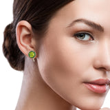 Model wearing vibrant peridot and tsavorite garnet earrings – HGM Jewelry New Orleans