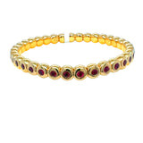 Stretch ruby bracelet in 18k yellow gold – handcrafted stackable jewelry by HGM Jewelry New Orleans