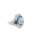 Side view of blue sapphire and diamond ring in platinum – handcrafted elegance from HGM Fine Jewelry