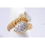 Side profile of Toi Et Moi Boucheron ring in textured yellow gold and diamonds