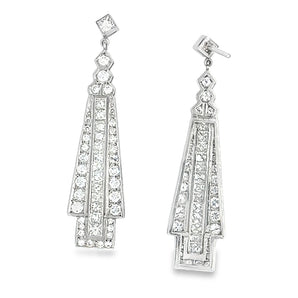 Side view of Art Deco diamond earrings in platinum showcasing hanging design and timeless detail – HGM Jewelry New Orleans