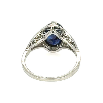 Underside of cabochon sapphire Art Deco ring – platinum vintage detail for New Orleans fine jewelry