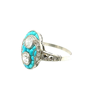 Angled view of vintage 1925 Art Deco ring with turquoise cabochons and rose cut diamonds