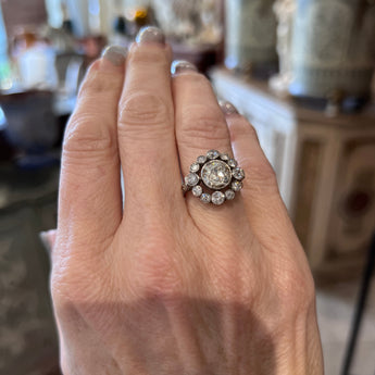 Antique Art Deco platinum ring with 1.90-carat center diamond shown on hand