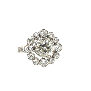 Top view of antique platinum ring with 1.90-carat European cut center diamond and bezel-set accents