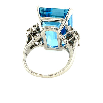 Aquamarine ring with tapered baguette diamonds and platinum setting

