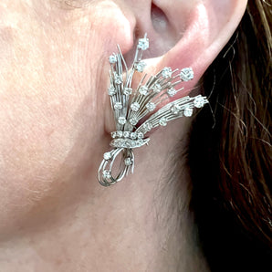 Model wearing vintage diamond spray earrings, New Orleans retro fine jewelry style