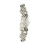 Side angle of 1950s diamond bracelet with intricate 18k white gold links and diamonds