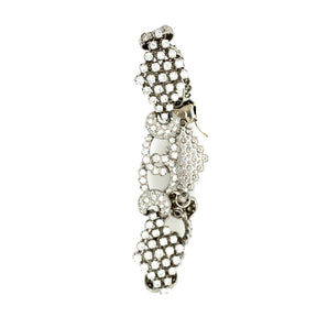Side angle of 1950s diamond bracelet with intricate 18k white gold links and diamonds